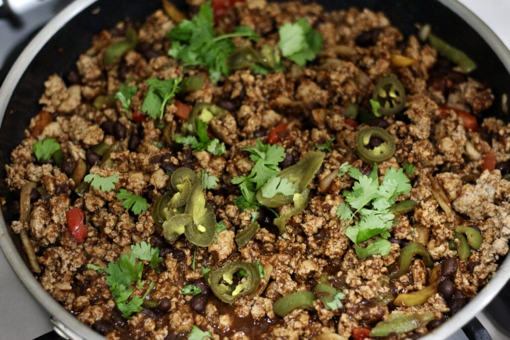 Skillet with Cilantro and Jalapeños