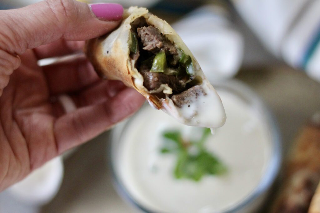 Cheesesteak Egg Rolls Dipped