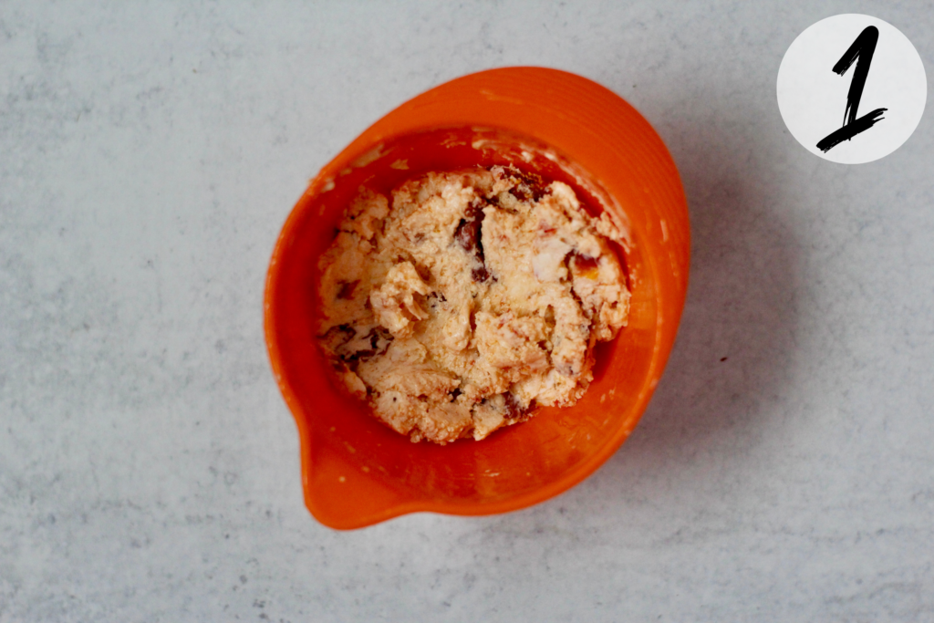 Mix sun-dried tomatoes and cheese