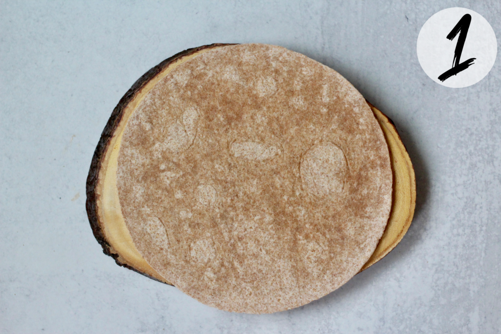 Lay tortilla on a flat surface