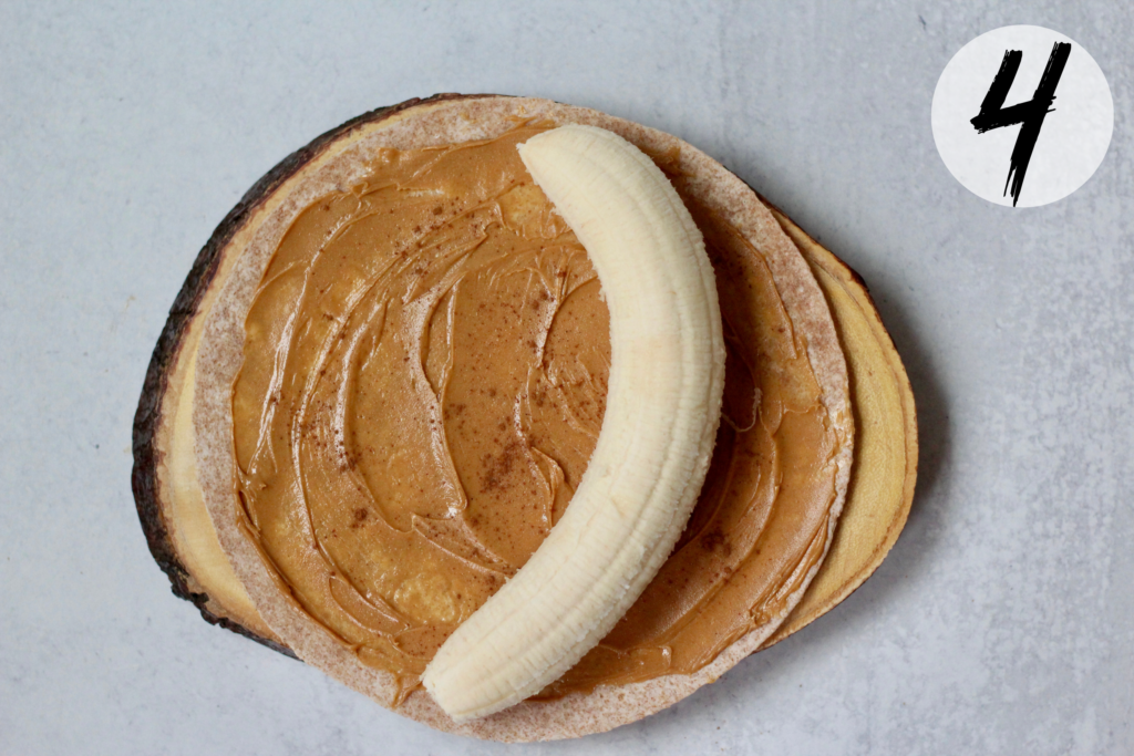 Lay banana on one end of tortilla