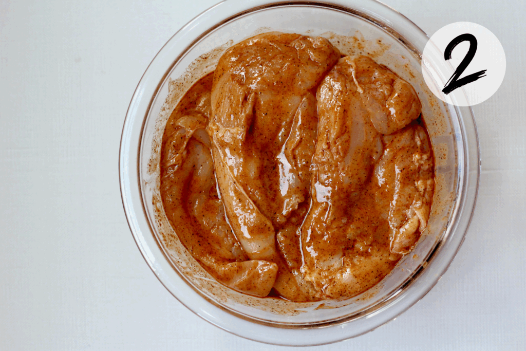 Season chicken breast with seasoning