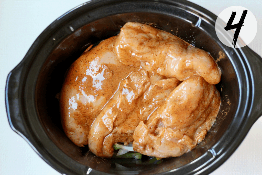 Place seasoned chicken breast on top