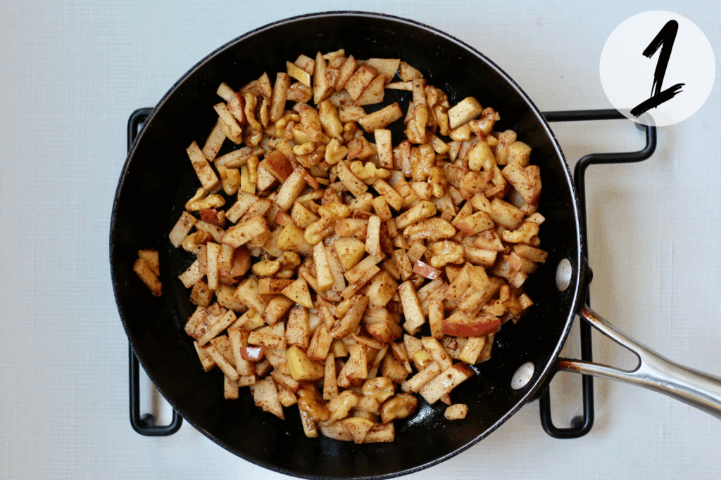 Sauté apples in a saucepan over medium heat