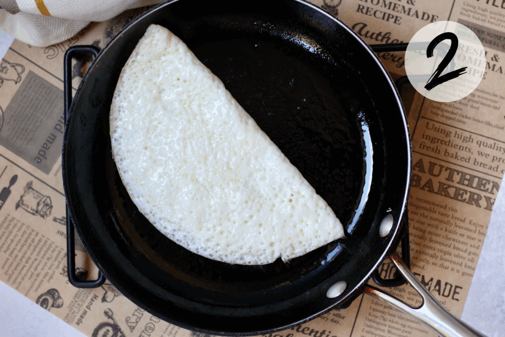 Fold egg whites in half