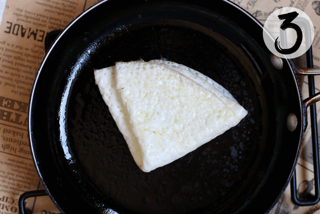 Fold egg whites into a triangle