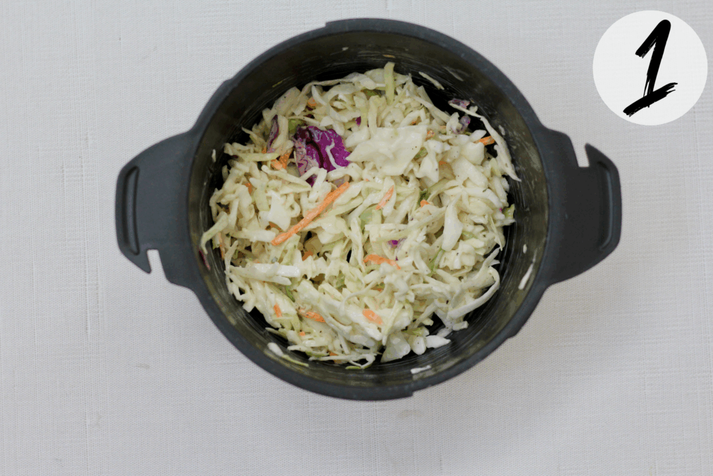 Mix cole slaw mix, mayo and vinegar