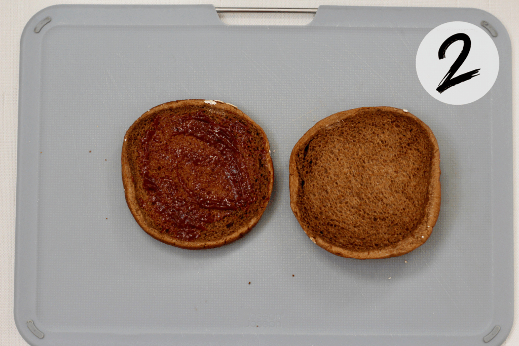 Spread thin layer of BBQ sauce on bun