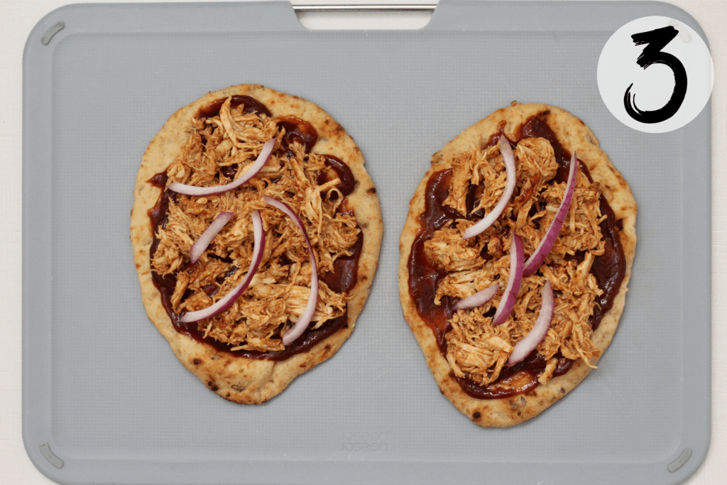 Add sliced onions on top