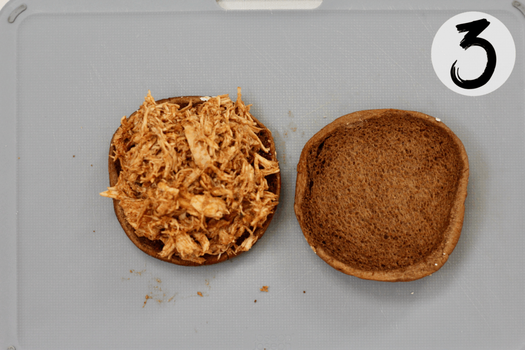 Add generous amount of shredded bbq chicken