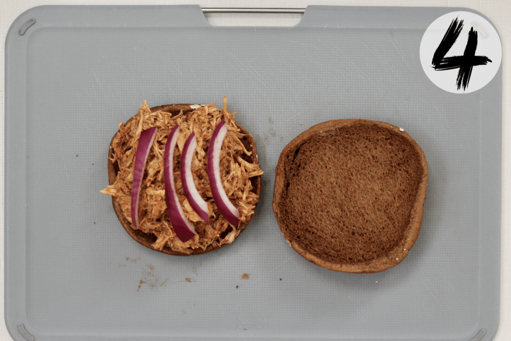Top with thinly sliced red onions
