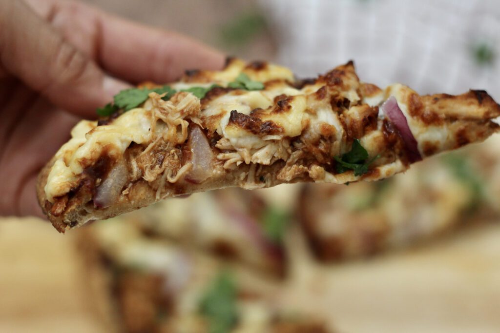 Held CPK BBQ Chicken Pizza