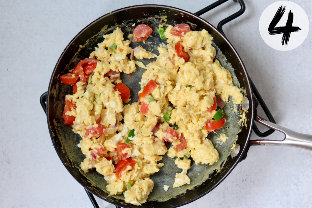 Scramble eggs until done