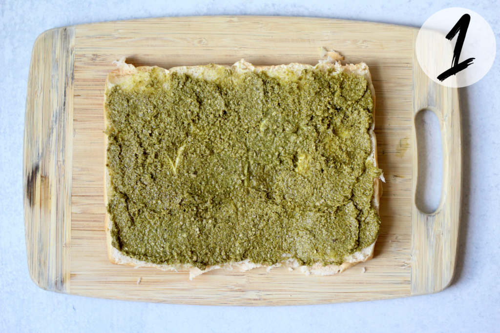 Spread pesto on half of slider rolls