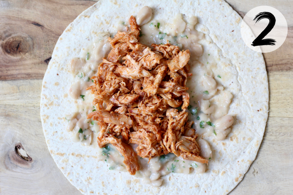 Top with pulled BBQ chicken