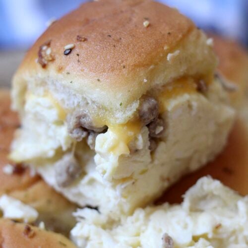 Breakfast Slider with scrambled eggs, turkey sausage and melted cheese on Hawaiian roll