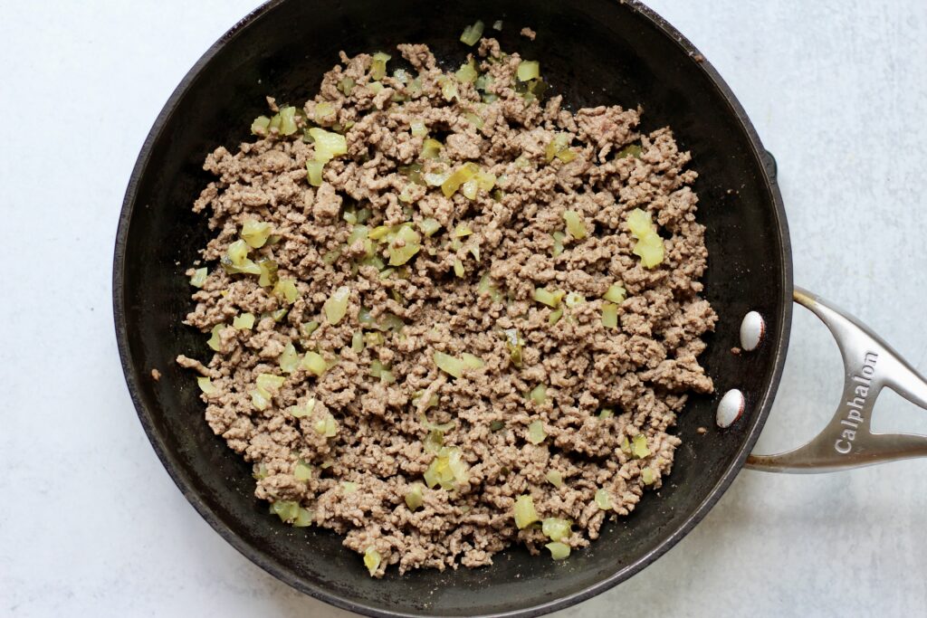 Seasoned ground beef and dill pickle filling for cheeseburger bombs