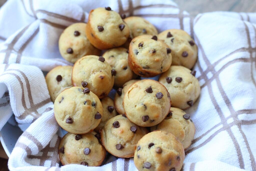 Mini Kodiak chocolate chip muffins arranged on a plate